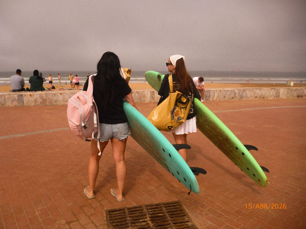 Surfers heading to the beach